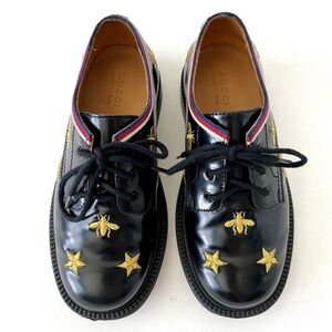 Gucci Black Leather Sneakers with Gold Accents
